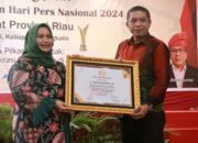 Bupati Pelalawan Terima Penghargaan JMSI Awards 2024